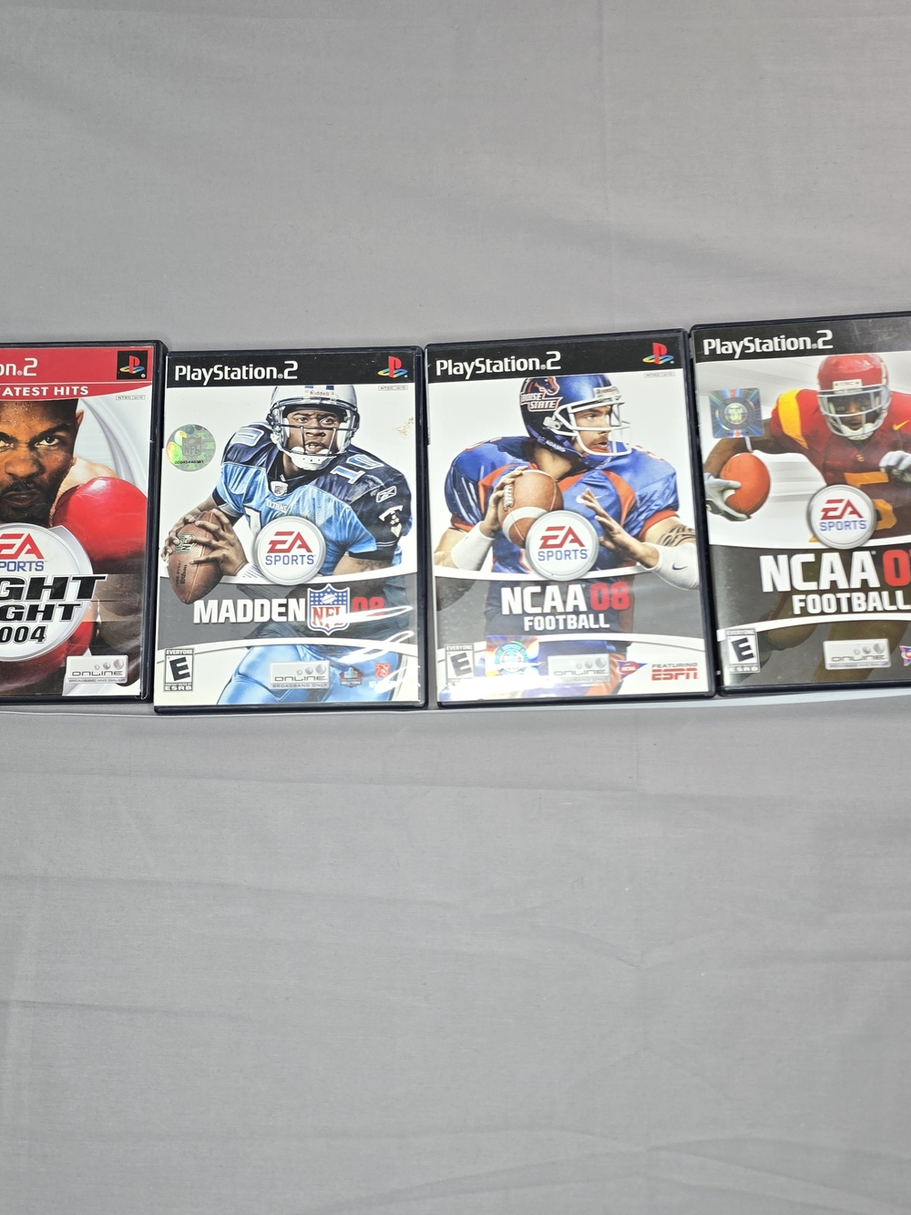 Lot of 4 PS2 Sports Games – Madden NFL 06, NCAA Football 06 & 07, Fight Night 20